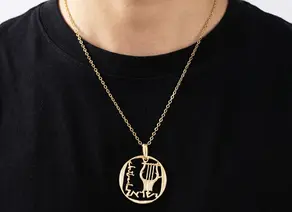 תליון כינור דוד חתוך ממטבע 25 אגורות, שנות ה 70